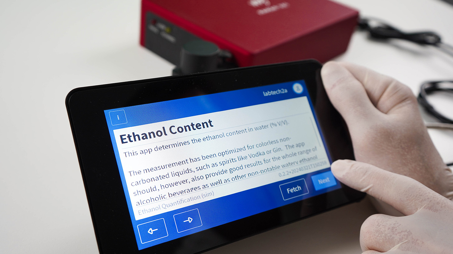 oscas app for ethanol analysis with raman spectrometer in the background